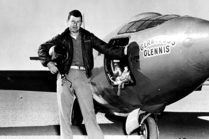 Chuck Yeager, standing next to the "Glamorous Glennis," the Bell X-1 experimental plane in which he first broke the sound barrier.