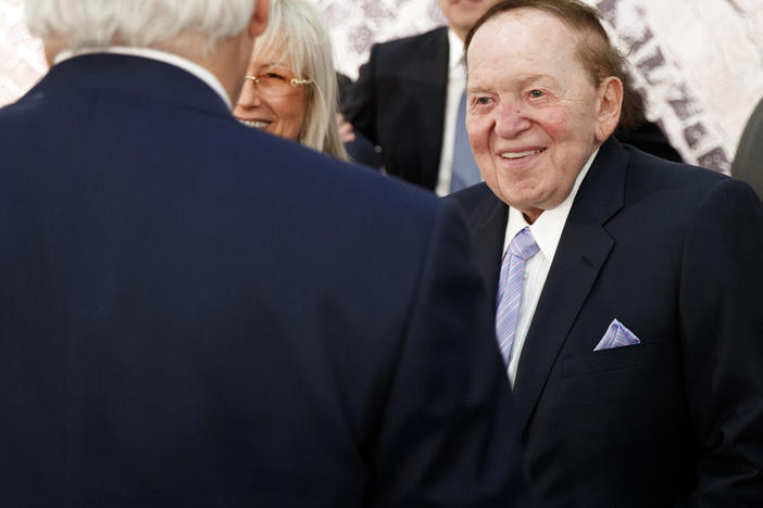 Sheldon Adelson, with his wife, Miriam, talks with then-Secretary of State Rex Tillerson before a 2017 speech by President Trump at the Israel Museum in Jerusalem.