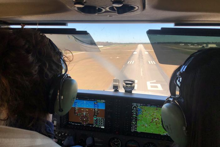 Pilot training is some of the most rigorous of all modes of transportation. Elizabeth White (L) practices landings with instructor Megan Brown at the airport in Auburn, Ala.