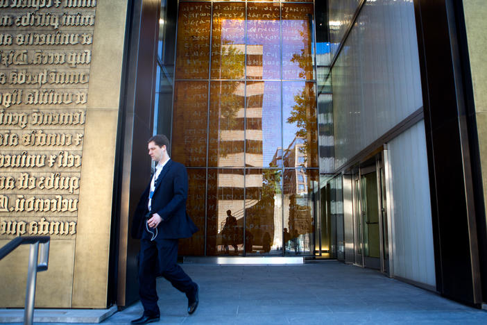 The Museum of the Bible is located near the National Mall in Washington, D.C. The entrance is flanked by large bronze doors depicting the first lines of the Book of Genesis.