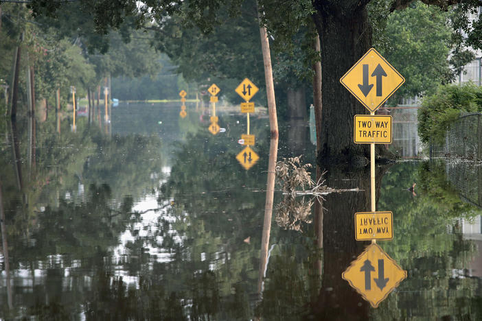 A flooded street in Orange, Texas in 2017. Climate-driven extreme rain and sea level rise, coupled with development in flood-prone areas, have led to more competition for limited federal flood mitigation dollars.