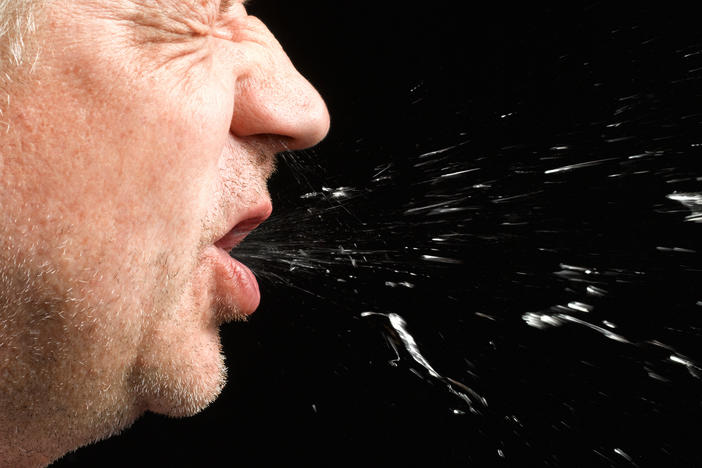A sneeze can carry the coronavirus pathogen in droplets and in aerosols — and they could land on a surface, making it a fomite.