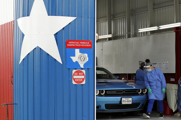 Patients can get COVID-19 diagnostic and antibody tests at a converted vehicle inspection station in San Antonio, as the state reports a record number of hospitalizations and single-day case increases.