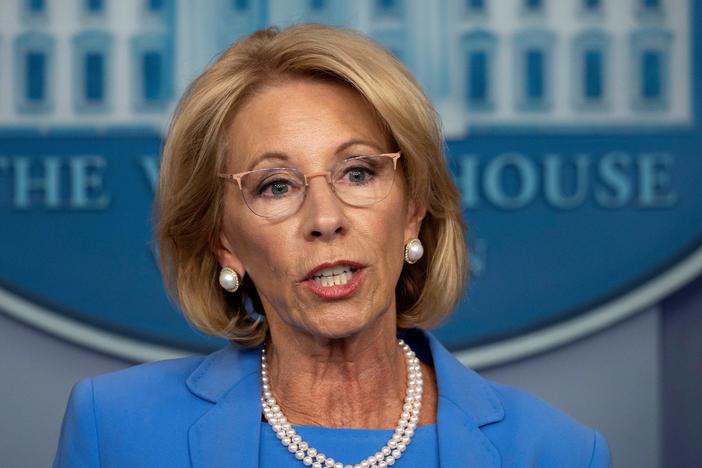 Education Secretary Betsy DeVos, seen here during a White House briefing in March, will participate in a panel discussion Tuesday on how to reopen America's schools safely.