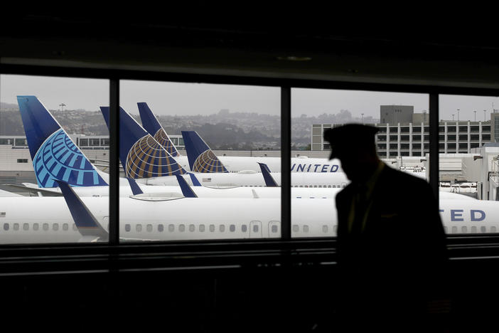 United Airlines says it plans to furlough up to 36,000 employees as the pandemic continues to batter the travel industry and much of the economy.
