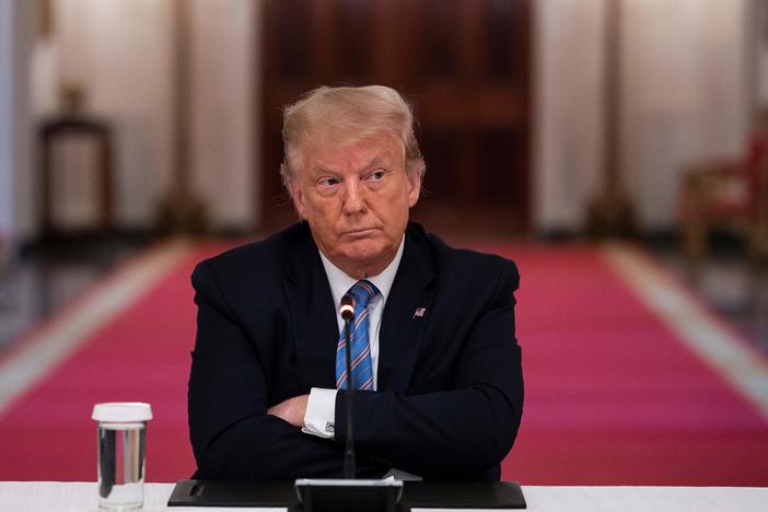 President Trump participates in a White House event Tuesday on how to reopen schools safely. After insisting that the Republican National Convention should be in person with thousands of people, Trump said he is "flexible" about the format.