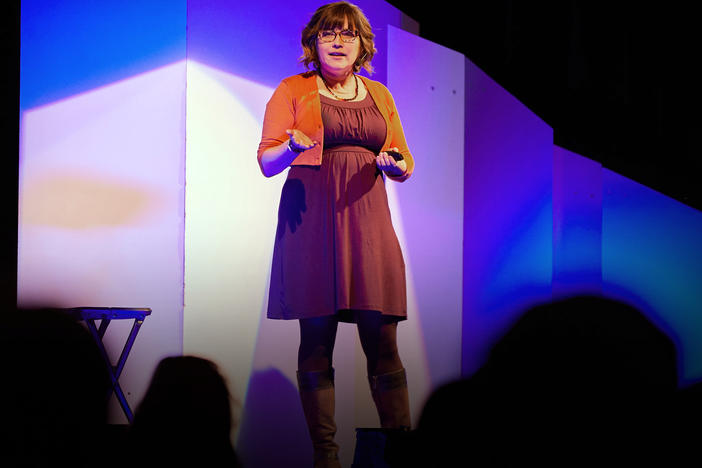 Librarian Dawn Wacek speaks from the TED stage.