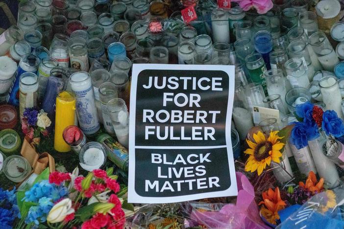 A makeshift memorial is pictured after a Juneteenth demonstration in Palmdale, Calif., at the tree where Robert Fuller was found dead.