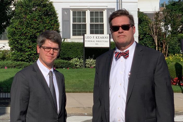 Fourth-generation funeral home director Patrick Kearns (left) and his business partner and brother-in-law Paul Kearns-Stanley stand in front of their funeral home in North Richmond Hill, Queens.