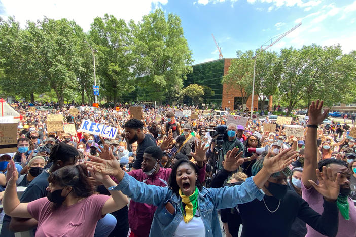 An angry and frustrated crowd of about 1,500 people call for the resignation of Richmond Mayor Levar Stoney and Richmond Police Chief Will Smith on June 2 outside of City Hall.