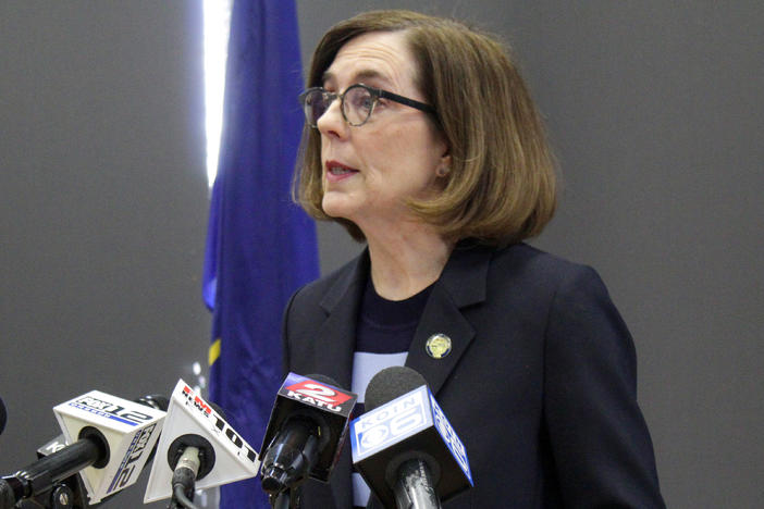 Oregon Gov. Kate Brown announced a statewide ban on indoor dining at bars and restaurants at a press conference in Portland on March 16. Nearly four months later, with COVID-19 cases on the rise after a phased-in economic reopening, she announced new restrictions including a 10-person limit on social gatherings.