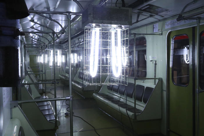 A quartz UV germicidal lamp is used to disinfect a train at the Sviblovo station of the Moscow Metro transit system.