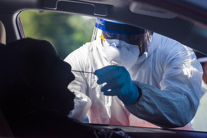 Testing performed by a private lab in a church parking lot in Macon. 