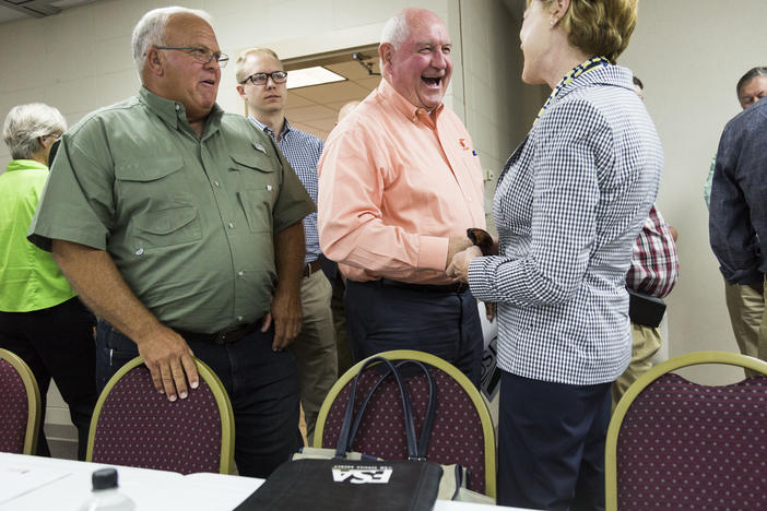 U.S. Secretary of Agriculture Sonny Perdue greets participants in the roundtable discussion put on by the Task Force on Rural Prosperity, a project of President Trump which Perdue heads, in Tifton, Ga. 