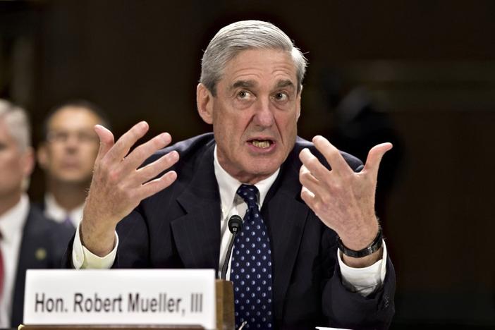 In this June 19, 2013, file photo, then-FBI Director Robert Mueller testifies on Capitol Hill in Washington. When special counsel Mueller testifies before Congress it will be a moment many have been waiting for, but it comes with risk for Democrats.