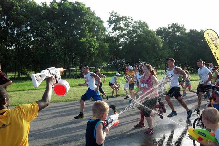 Runners get soaked at the Summer Soaker 5K on Hutchinson Island.