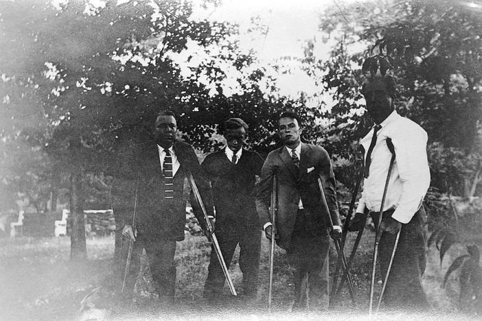 Franklin D. Roosevelt (right) with three other polio patients in Warm Springs, Georgia, in 1925.