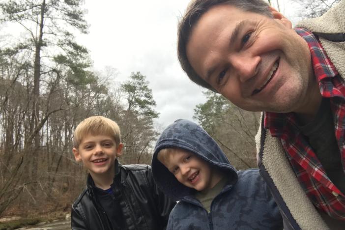 Steve Fennessy with sons Casey (left) and Jack (center).)