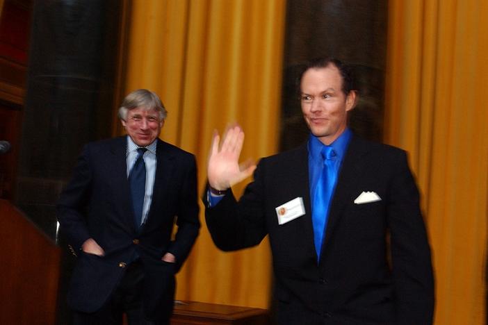 Columbia University President Lee C. Bollinger (left) presents Mike Luckovich with the 2006 Pulitzer Prize in Editorial Cartooning