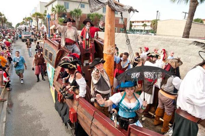 A group of festivalgoers enjoy the sights and sounds of The Tybee Island Pirate Festival. 