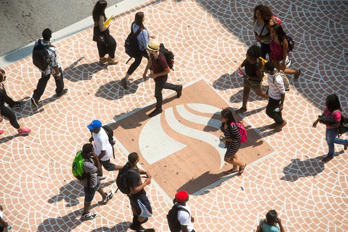 Georgia State University President Mark Becker says a limited number staff and faculty can return to the campuses next week. 