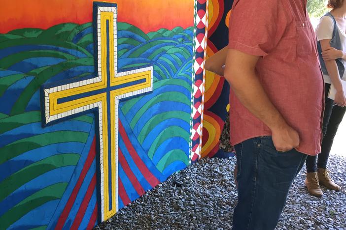 A brightly-colored cross at Pasaquan 
