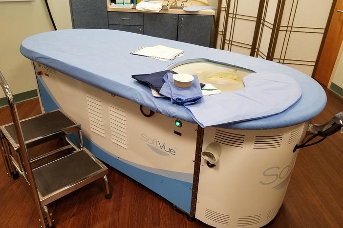 Patients lie on top of the SoftVue for a 3D ultrasound that can show possible cancers that don't show up on a mammogram.