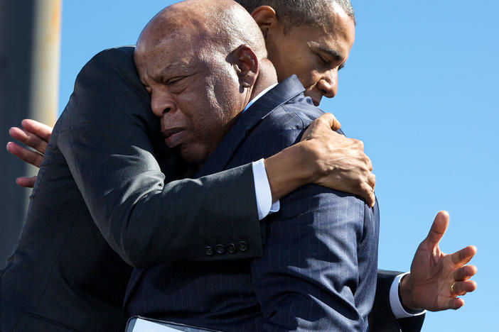 President Barack Obama hugs Rep. John Lewis, D-Ga., after his introduction during the event to commemorate the 50th Anniversary of Bloody Sunday and the Selma to Montgomery civil rights marches, at the Edmund Pettus Bridge in Selma, Ala., March 7, 2015.