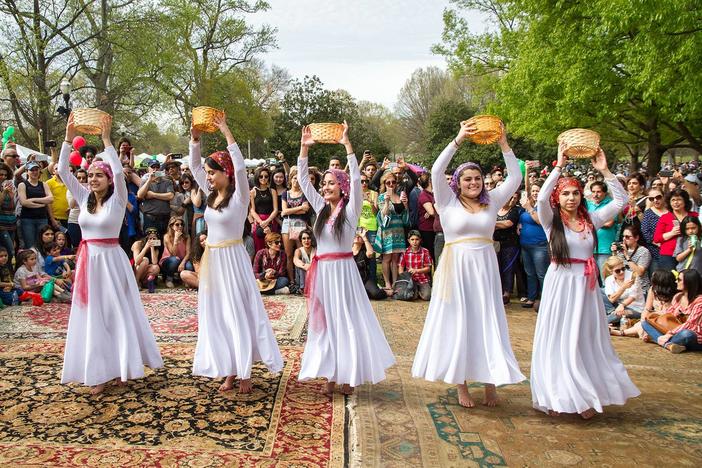 Women dance at the Atlanta Persian Festival in Piedmont Park on April 1 2018. 
