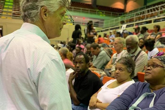 Savannah Mayor Eddie Deloach (left) speaks with residents during storm preparation for Hurricane Dorian