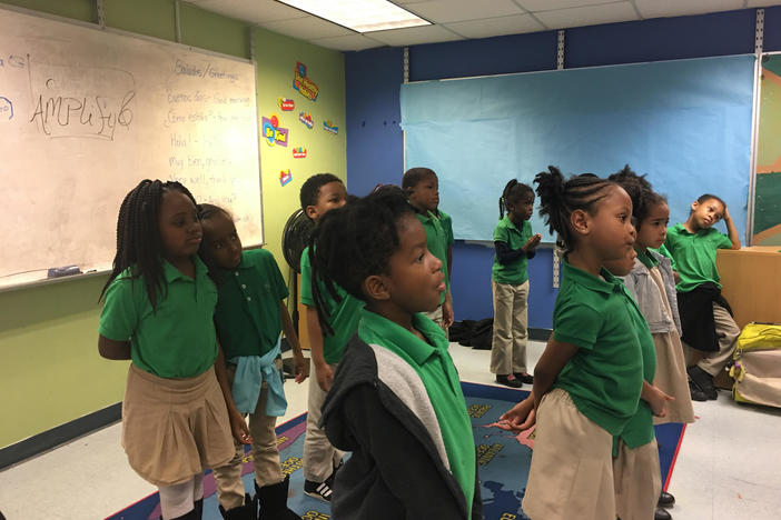 Children in the Atlanta Music Project prepare to sing.