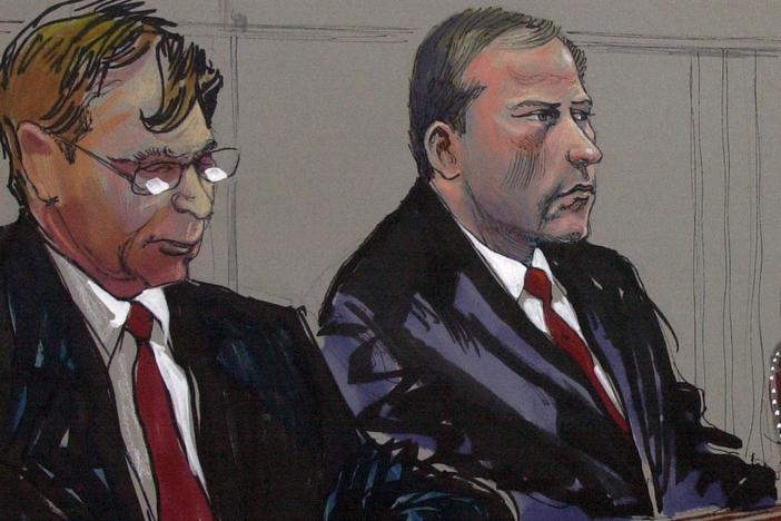 Defense attorney Richard Jaffe, left, and bomber Eric Rudolph, right, are shown in this courtroom artist's rendering, during a hearing Tuesday, June 22, 2004, in Huntsville, Ala.