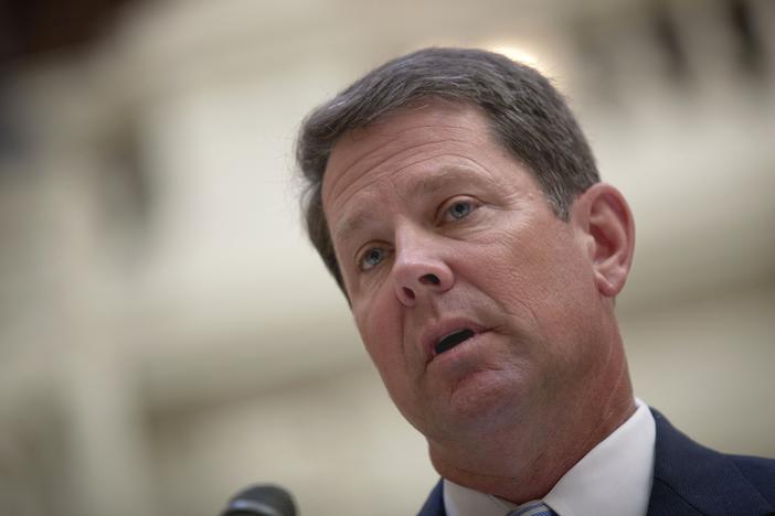 Georgia Secretary of State Brian Kemp speaks in 2011 at a news conference in Atlanta.