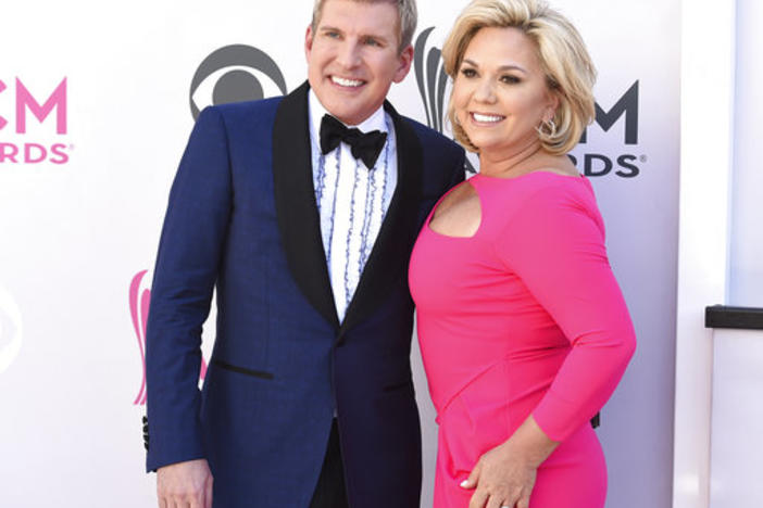 Todd Chrisley, left, and Julie Chrisley arrive at the 52nd annual Academy of Country Music Awards at the T-Mobile Arena on Sunday, April 2, 2017, in Las Vegas.