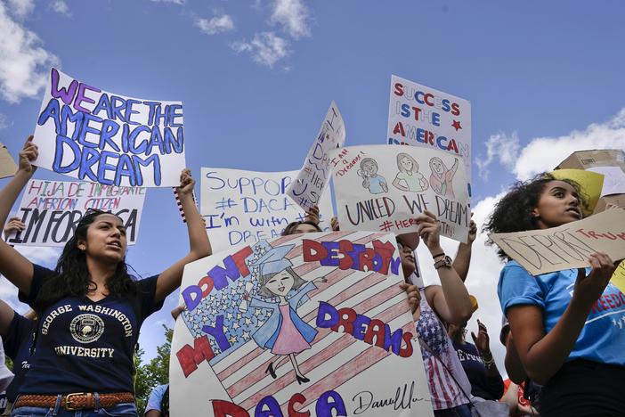 Supporters of Deferred Action for Childhood Arrival program (DACA) demonstrate on Pennsylvania Avenue in front of the White House in Washington, Saturday, Sept. 9, 2017. 