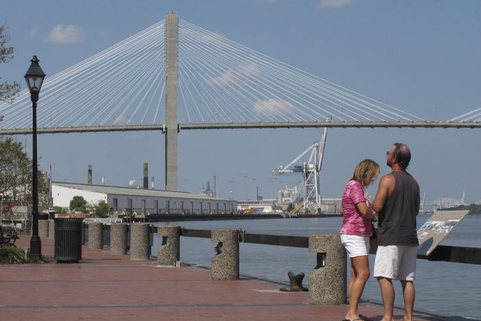 The Eugene Talmadge Memorial Bridge stretches across the skyline over Savannah's downtown riverfront on Thursday, Sept. 28, 2017.