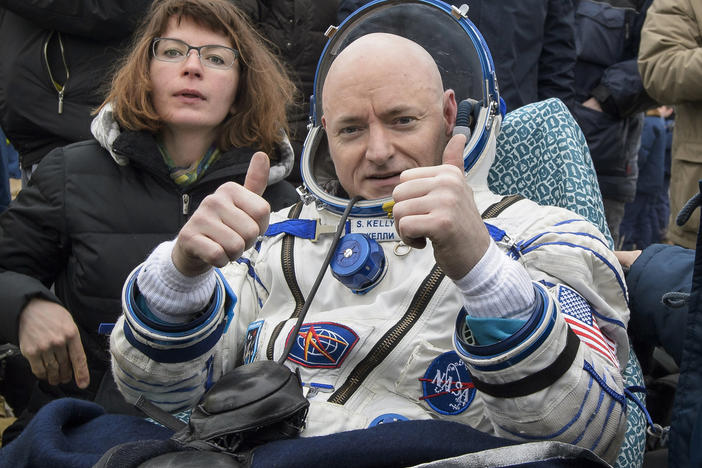 International Space Station (ISS) crew member Scott Kelly of the U.S. reacts after landing near the town of Dzhezkazgan, Kazakhstan