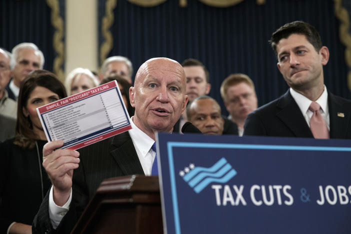House Ways and Means Committee Chairman Kevin Brady, R-Texas, joined by Speaker of the House Paul Ryan, R-Wis., right, as they unveil the GOP's far-reaching tax overhaul, on Capitol Hill in Washington, Thursday, Nov. 2, 2017.