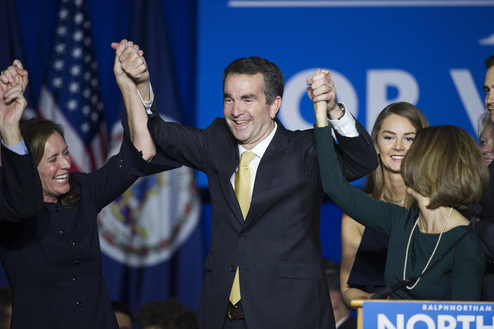 Virginia Gov.-elect Ralph Northam celebrates his election victory with his wife Pam and daughter Aubrey, Tuesday, Nov. 7, 2017.