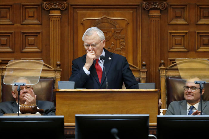 Georgia Gov. Nathan Deal fights back tears while delivering the State of the State address on the House floor as Lt. Gov. Casey Cagle, right, and House Speaker David Ralston look on at the state Capitol in Atlanta, Thursday, Jan. 11, 2018.