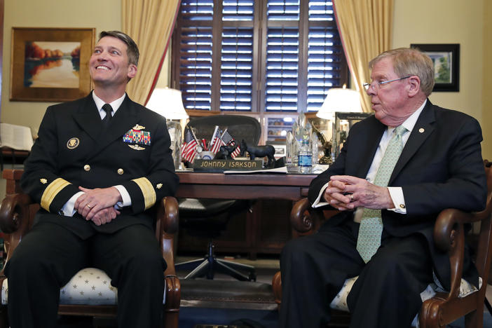 U.S. Navy Rear Adm. Ronny Jackson, M.D., left, sits with Sen. Johnny Isakson, R-Ga., chairman of the Veteran's Affairs Committee, before their meeting on Capitol Hill, Monday, April 16, 2018 in Washington. 