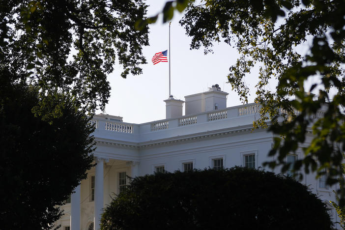 The American flag flies at half-staff above the White House in honor of Sen. John McCain, R-Ariz., Sunday, Aug. 26, 2018, in Washington. McCain, 81, died Saturday at his ranch in Arizona after a yearlong battle with brain cancer.
