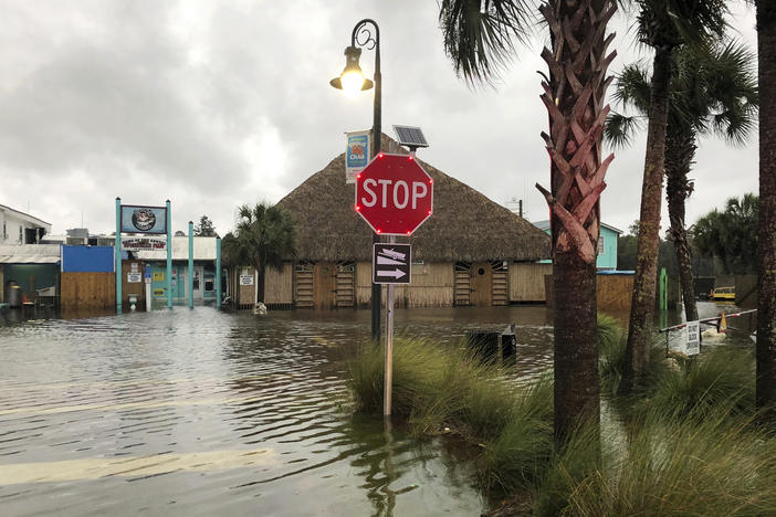 The St. Marks River overflows into the city of St. Marks, Fla., ahead of Hurricane Michael, Wednesday, Oct. 10, 2018. The hurricane center says Michael will be the first Category 4 hurricane to make landfall on the Florida Panhandle.