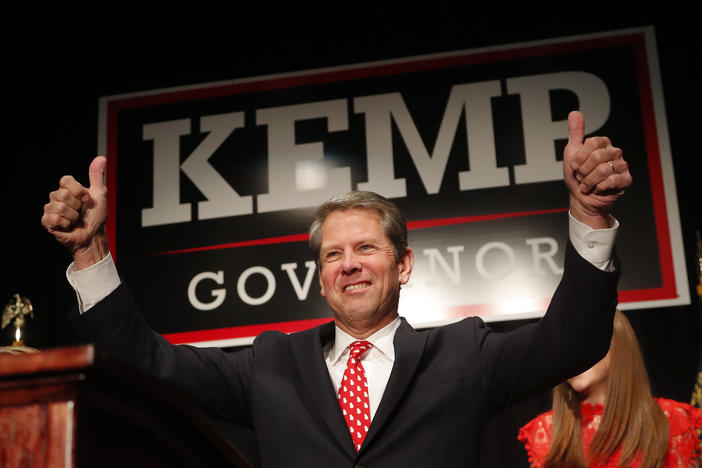 Georgia Republican gubernatorial candidate Brian Kemp gives a thumbs-up to supporters, Wednesday, Nov. 7, 2018, in Athens, Ga. 