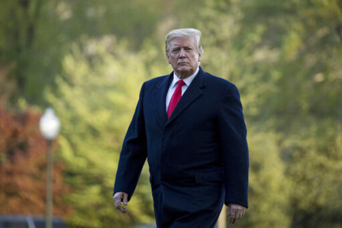 President Donald Trump walks on the South Lawn as he arrives at the White House in Washington, Monday, April 15, 2019.