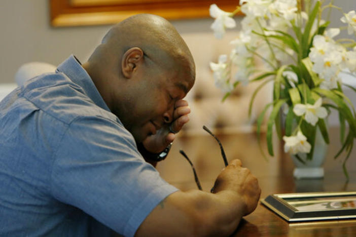 Chris Parks wipes away a tear while talking about the murder of his brother. Marion Wilson Jr. and Robert Earl Butts Jr. were convicted of murder and sentenced to death in the 1996 killing of 24-year-old Donovan Corey Parks.