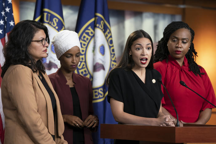 U.S. Rep. Alexandria Ocasio-Cortez, D-N.Y., speaks as, from left, Rep. Rashida Tlaib, D-Mich., Rep. Ilhan Omar, D-Minn., and Rep. Ayanna Pressley, D-Mass., listen during a news conference at the Capitol in Washington, Monday, July 15, 2019.