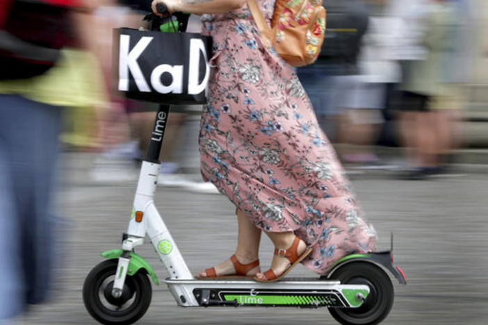 A man was struck by a truck and killed while riding an e-scooter in Atlanta Tuesday.