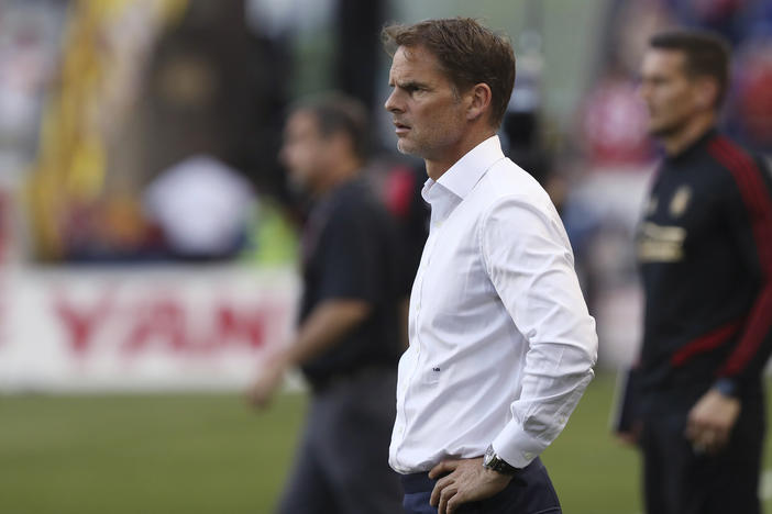 Atlanta United coach Frank de Boer watches during the second half of the team's MLS soccer match against the New York Red Bulls in Harrison, N.J. 