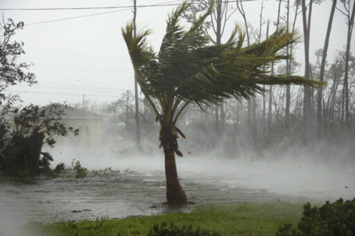 A road is flooded during the passing of Hurricane Dorian in Freeport, Grand Bahama, Bahamas, Monday, Sept. 2, 2019. 